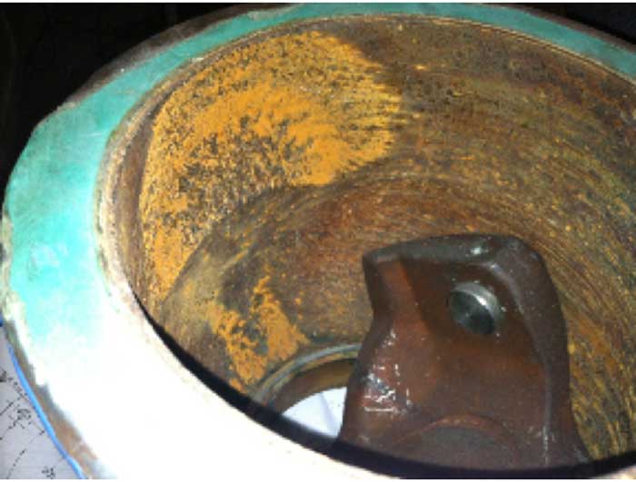 Severe pitting damage from cavitation resulted in a pinhole leak