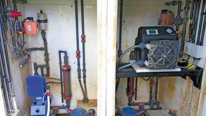 Image 2. The peristaltic metering pump is next to one of the diaphragm pumps it replaced at the Maple Lodge Sewage Treatment Works.