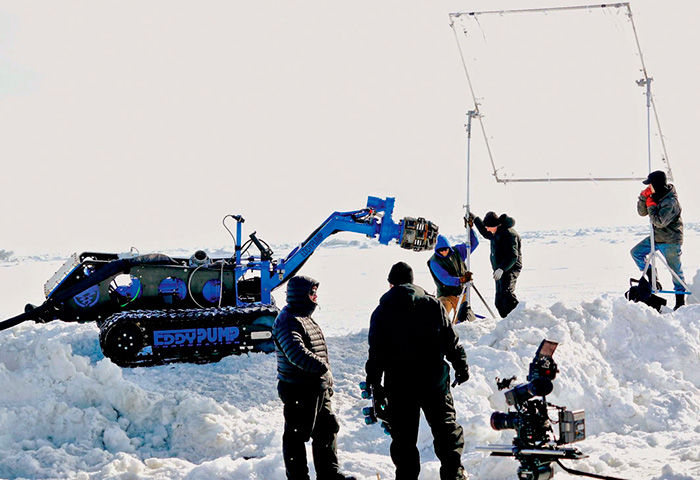 Image 1. A Discovery Channel camera crew records video of the remote-operated submersible dredge used for gold mining in Alaska. (Images courtesy of Eddy Pump)