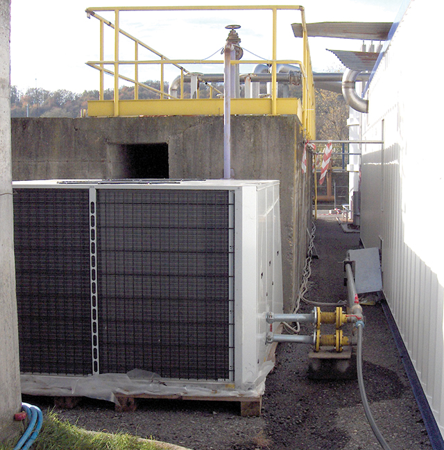 Image 2. Ozone container and chiller with concrete aeration tank and pipe.