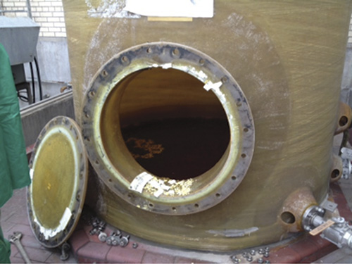 Manway of an HF acid re-boiler