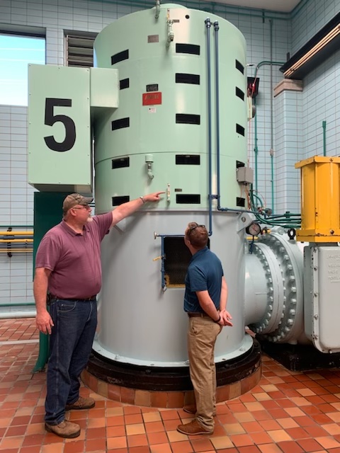  SMMWSC’s general manager, Dan Stickel, and Operations Manager Tom McLavy inspecting Pump 5 after its reinstallation