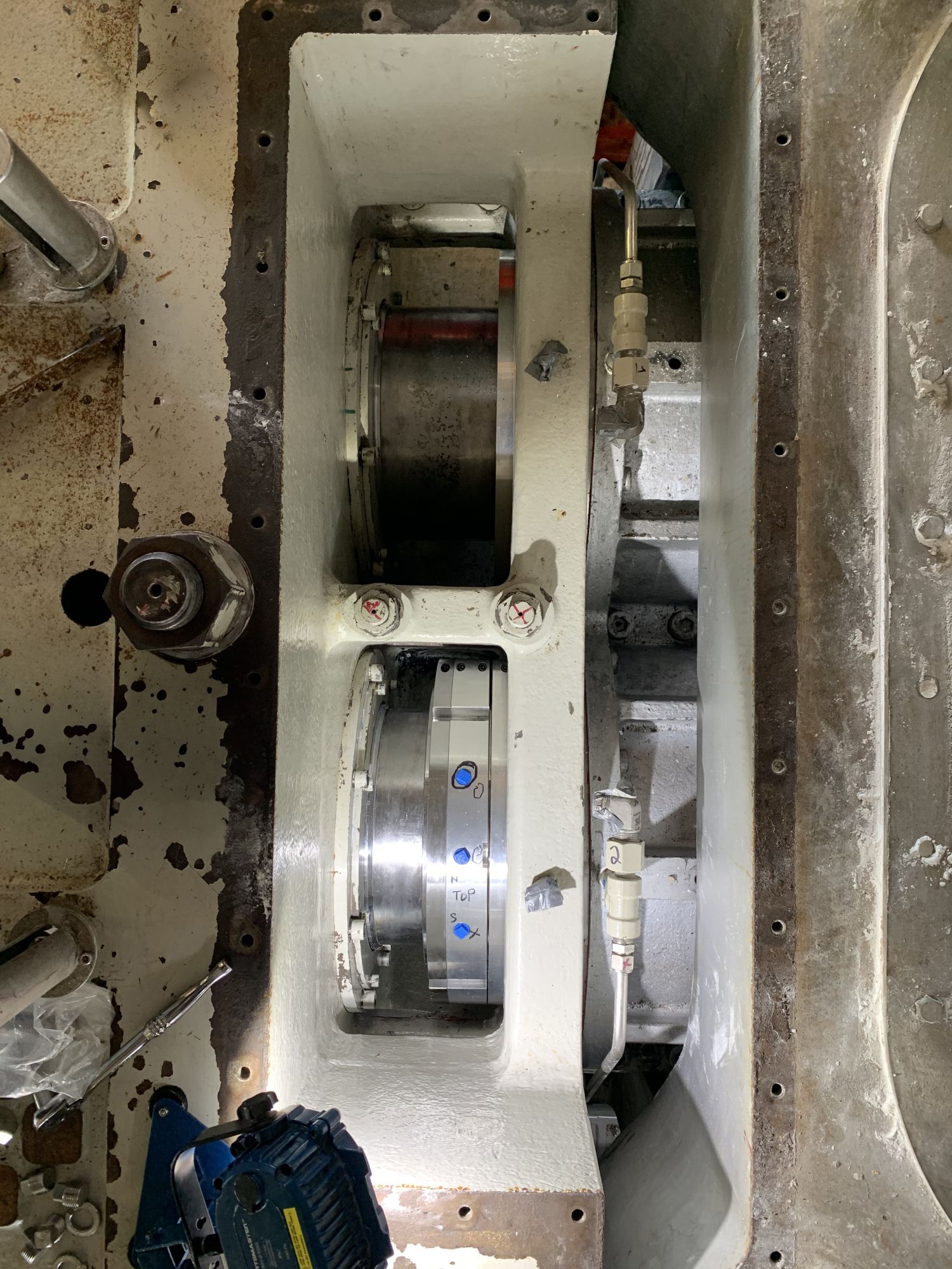 IMAGE 1: Installing the first of two side-by-side shaft seals on a twin shaft extruder (Images courtesy of Inpro/Seal)