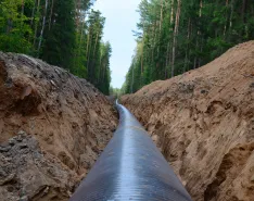 natural gas pipeline going through forest setting