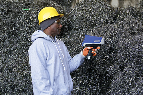 XRF analyzer being used in a scrap yard.