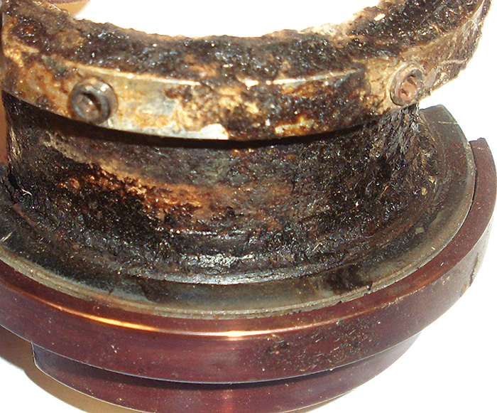 Image 2. This sleeve shows how excessive heat and poor product circulation resulted in seal failure. Accumulated thermal damage and the resulting product solidification compromised the secondary sealing surfaces. An appropriately rated flush and/or steam quench plan would have dramatically extended this seal's useful life.