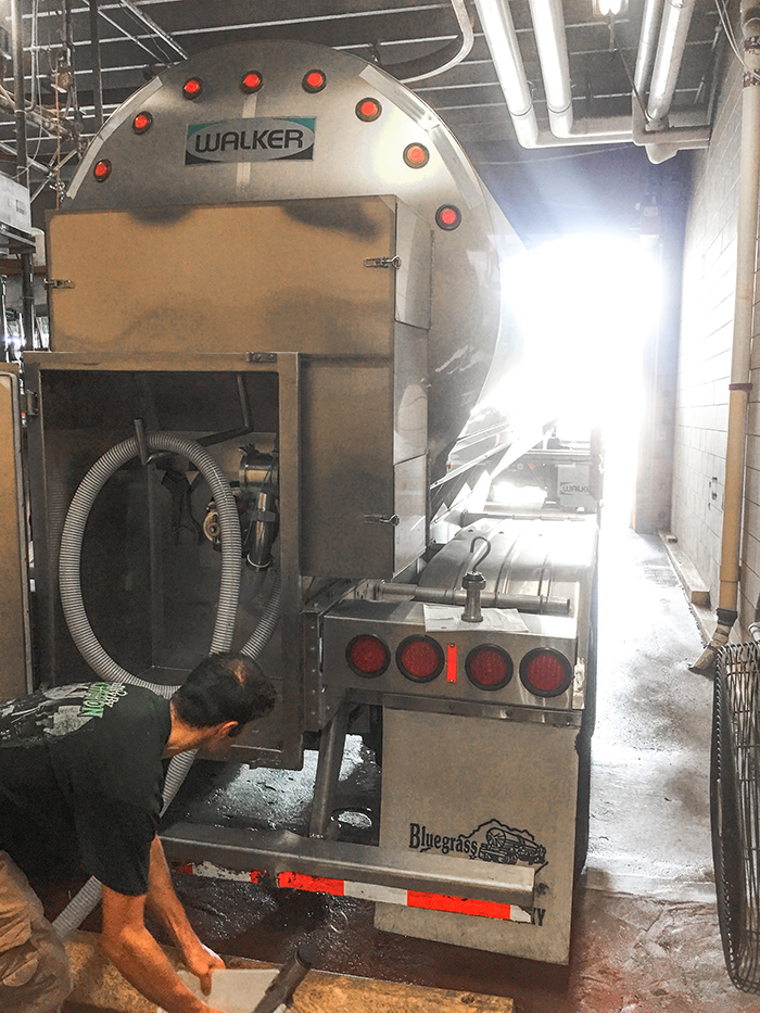 The process requires a cleaning solution to properly sanitize the tanks and trucks