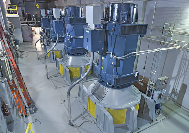 Inside the flood control station for the Louisville, Kentucky, Metropolitan Sewer District showing the pumps installed