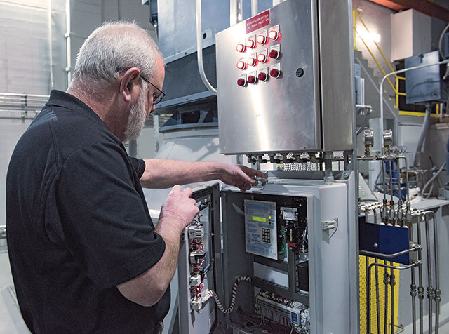 Jeff Lukemeyer at one of the control stations for the pumps