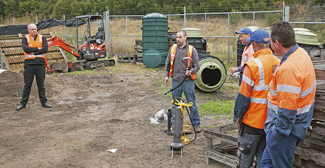 Image 2. E/One's Derek Lachut providing in-depth installation training on-site (Courtesy of Environment One Corporation)