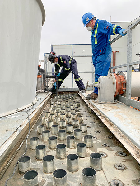 IMAGE 3: Water treatment specialists perform thorough inspections of all system components.