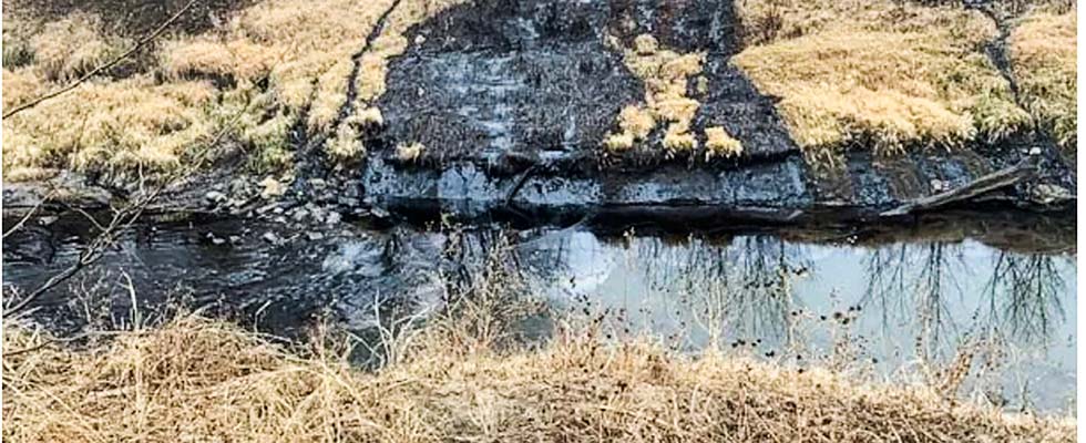 IMAGE 2: Oil flowing from Keystone pipeline leak into Mill Creek. Source: EPA   