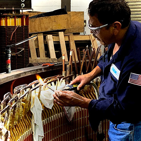 IMAGE 3: Soldering connections for a generator rewind