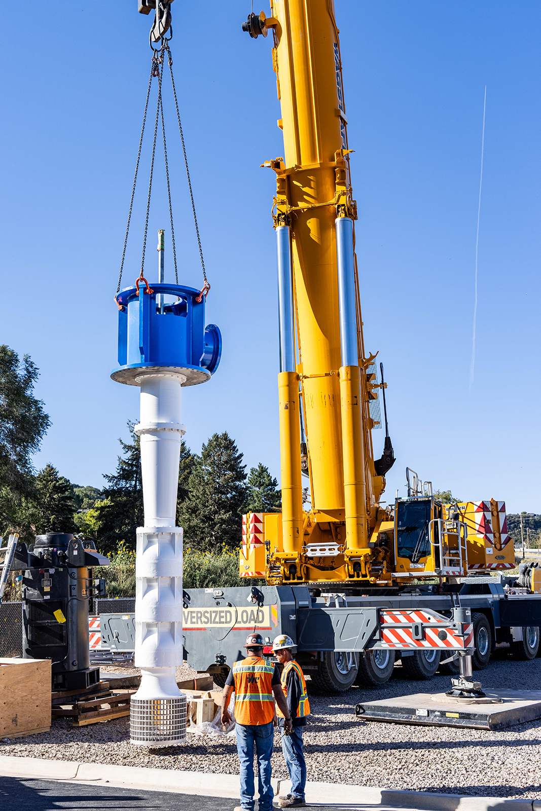 A floway vertical turbine pump is lifted into position for installation in Ogden, Utah.