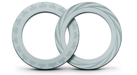 IMAGE 3: These seal face patterns are designed for gas-lubricated dry gas seals. The left face features a lift-generating groove pattern, while the right face shows a spiral groove configuration to optimize gas film stability and minimize leakage. (Image courtesy of Flowserve)