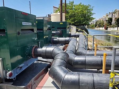 IMAGE 3: Well-designed manifolds maximize flow and prevent bottlenecks in multipump  bypass systems.