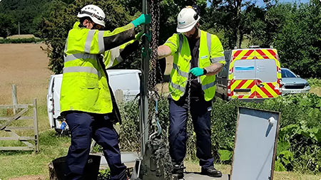IMAGE 1: Maintenance workers address a pump blockage (Images courtesy of Samotics)