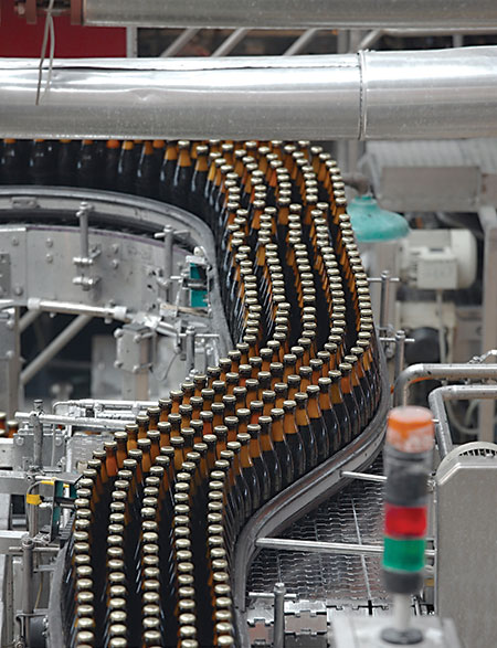 Bottle production through automatic lubrication system