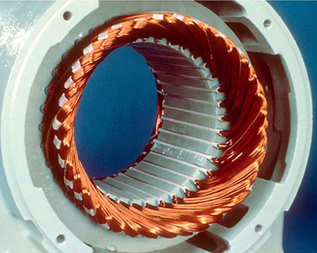 IMAGE 2: Stator winding showing insulated wire and insulated lamination slots
