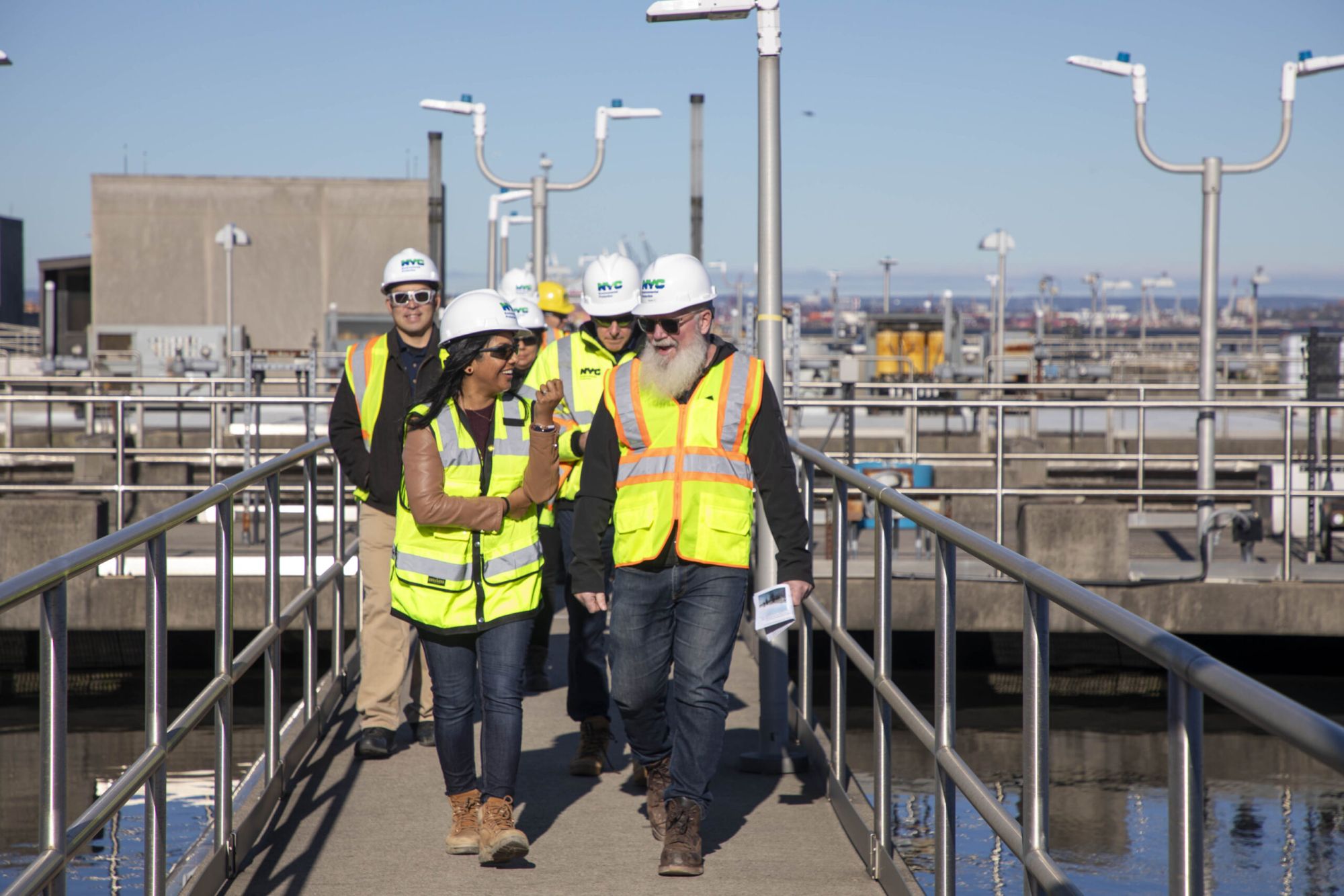 Individuals on a tour of the Kensico Reservoir in New York