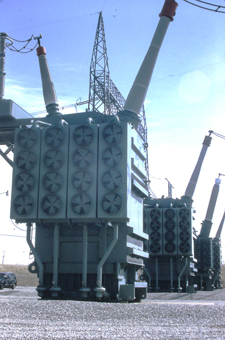 765 kV single-phase transformer note 4 transformer oil pumps at the base.