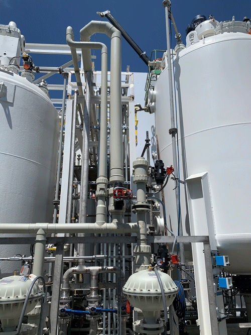 IMAGE 2: Glass-filled polyamide pneumatic actuators automating Type-21 ball valves in a lithium nickel slurry application.
