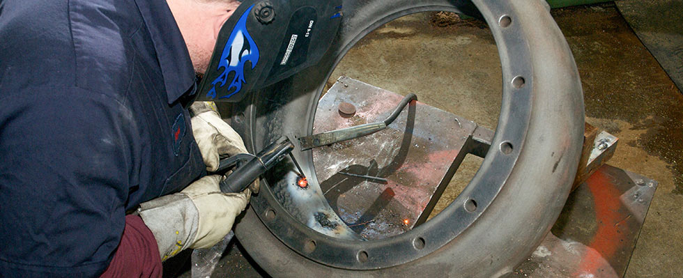 Welding repair of an impeller housing.