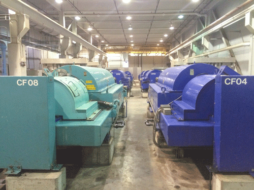  Sludge dewatering centrifuge in a municipal facility showing—an example of redundant capacity