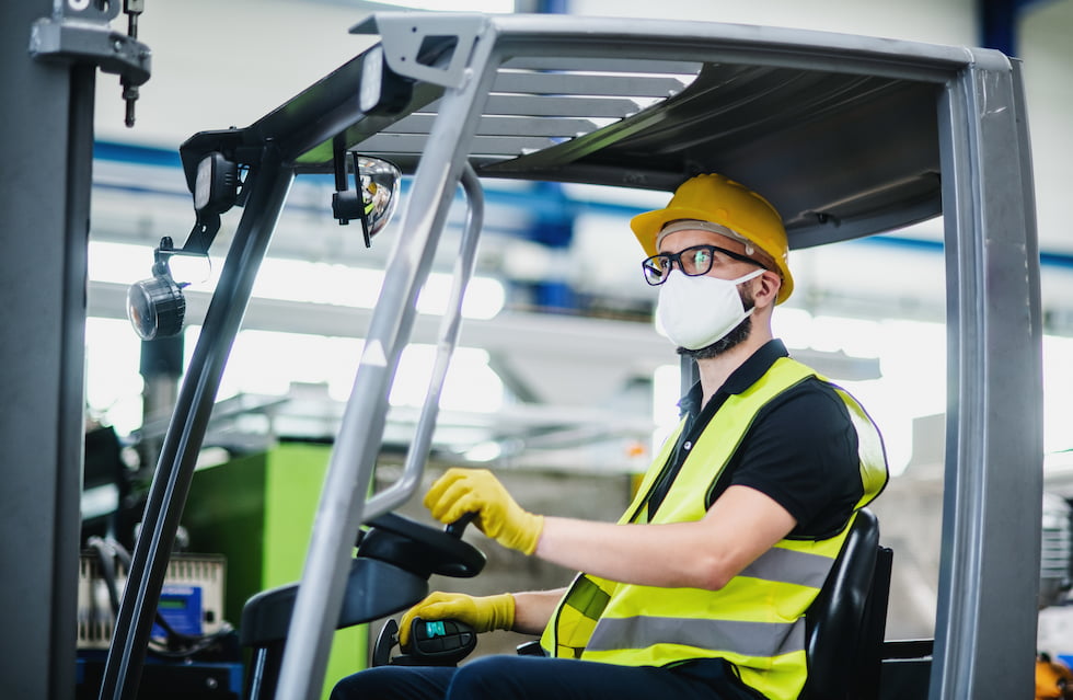 forklift driver wearing ppe