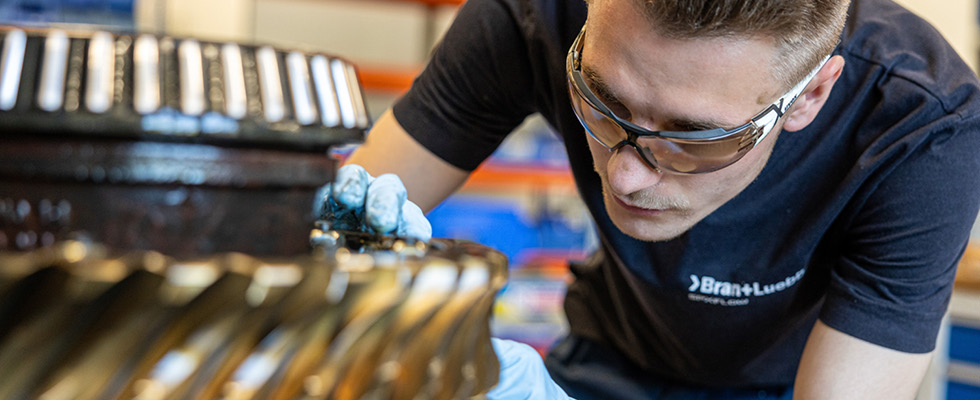 IMAGE 1: Technician inspecting gearbox wear (Images courtesy of SPX Flow)