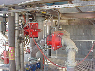 A pneumatically actuated, 10-inch, dual pinch design on a power plant FGD scrubber system