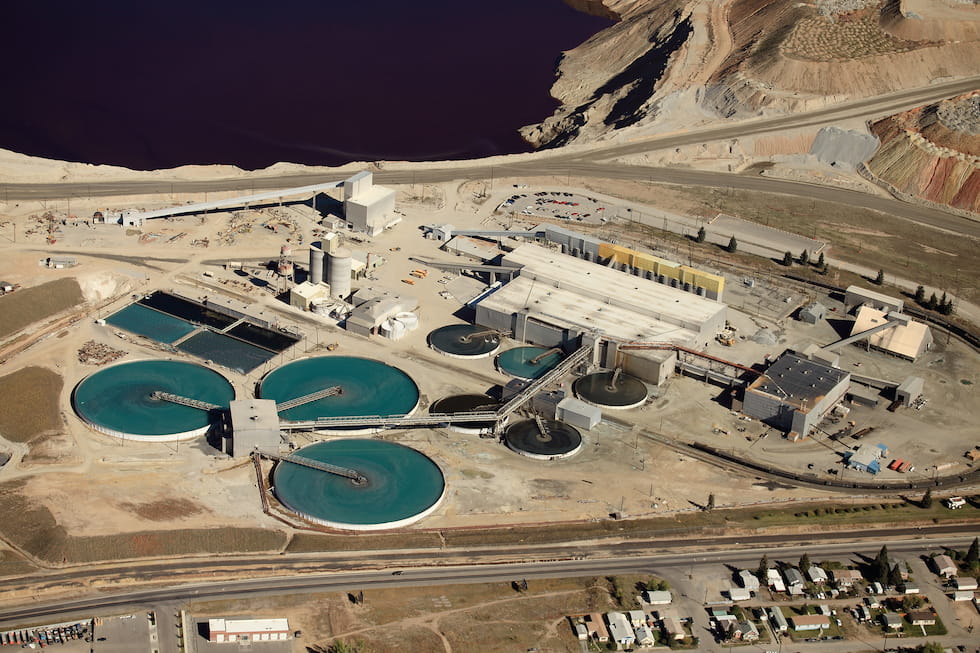 When the retention pond becomes full of tailings-heavy wastewater at a mining op