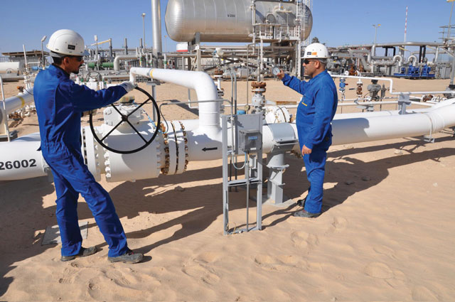 Image 2. Wintershall employees conducting a routine inspection at the Nakhla site