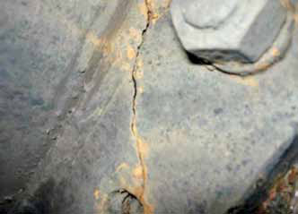 Close-up of the broken pipe flange