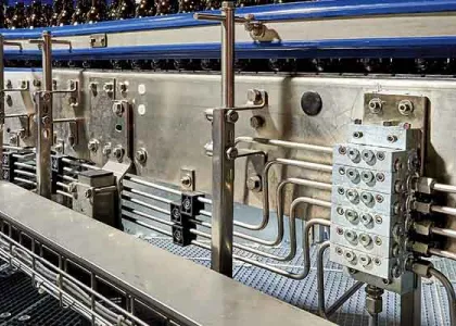 IMAGE 1: Series progressive divider valves proportion oil or grease to the various lubrication points on the machinery/equipment. (Images courtesy of Graco)