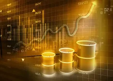 Oil barrels in front of a fluctuating financial chart