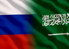 Russian flag and Saudi flag