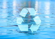 Recycyling symbol over water background