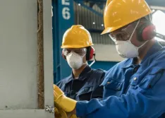 manufacturing workers wearing masks