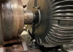 Undesired example of overlubricated motor inboard bearing