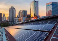 solar panels and city skyline