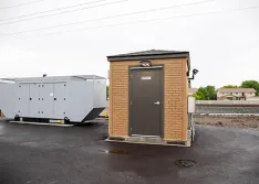 IMAGE 2: Prefabricated control building  and generator