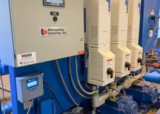 Newly installed control panel and  variable frequency drives customized to fit with the existing booster pump system equipment