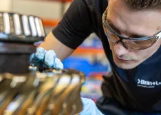 IMAGE 1: Technician inspecting gearbox wear (Images courtesy of SPX Flow)