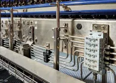 IMAGE 1: Series progressive divider valves proportion oil or grease to the various lubrication points on the machinery/equipment. (Images courtesy of Graco)